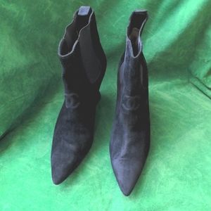 Black Chanel suede boots with logo on top